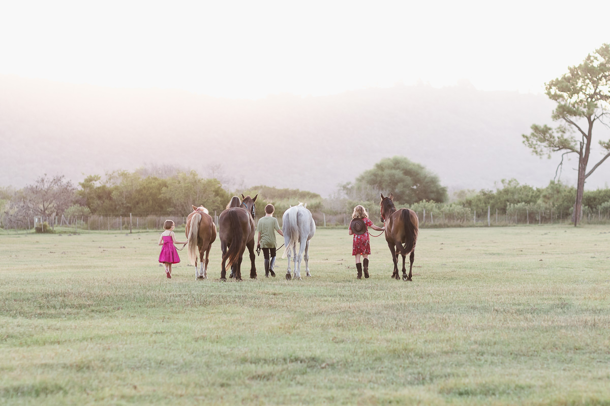 Garden Route photographer moi du toi sunset equine photo shoot session with teenagers and horses in Sedgefield
