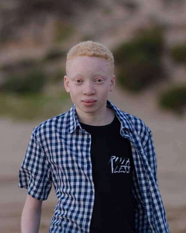 Teenage boy portrait on a Sedgefield beach photoshoot