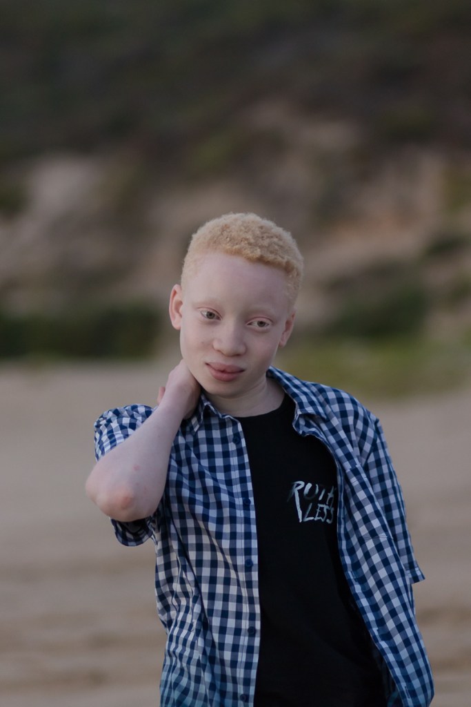 Teenage boy portrait on a Sedgefield beach photoshoot