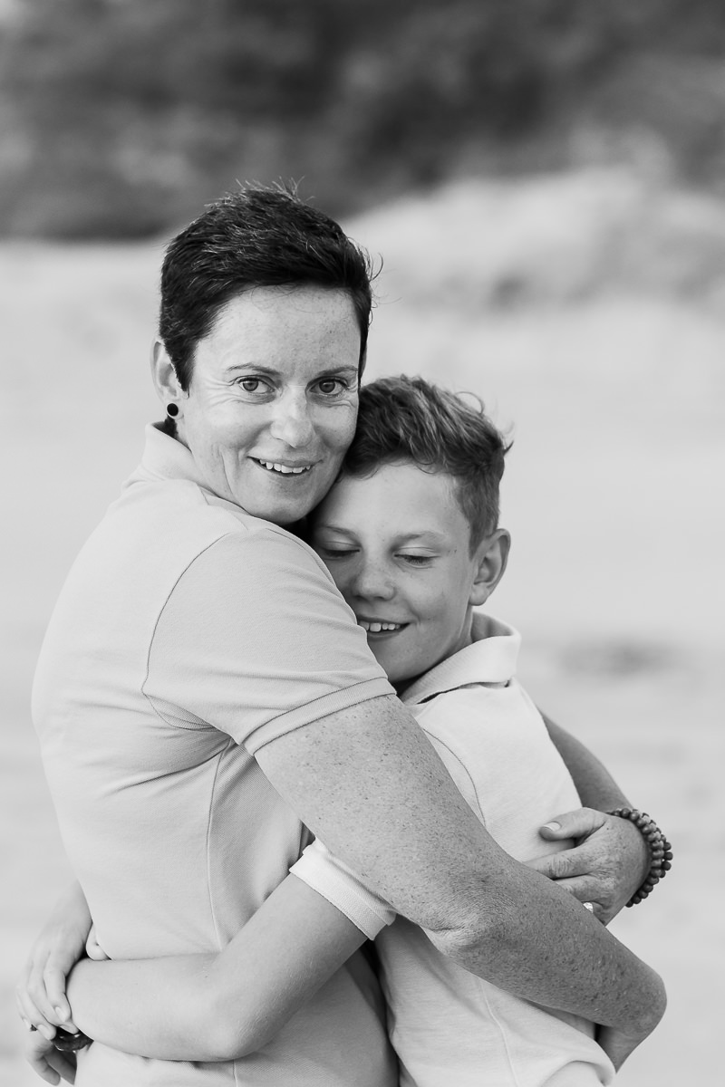 Mother and son on a beach at sunset in Sedgefield garden route during a photoshoot by moi du toi photography