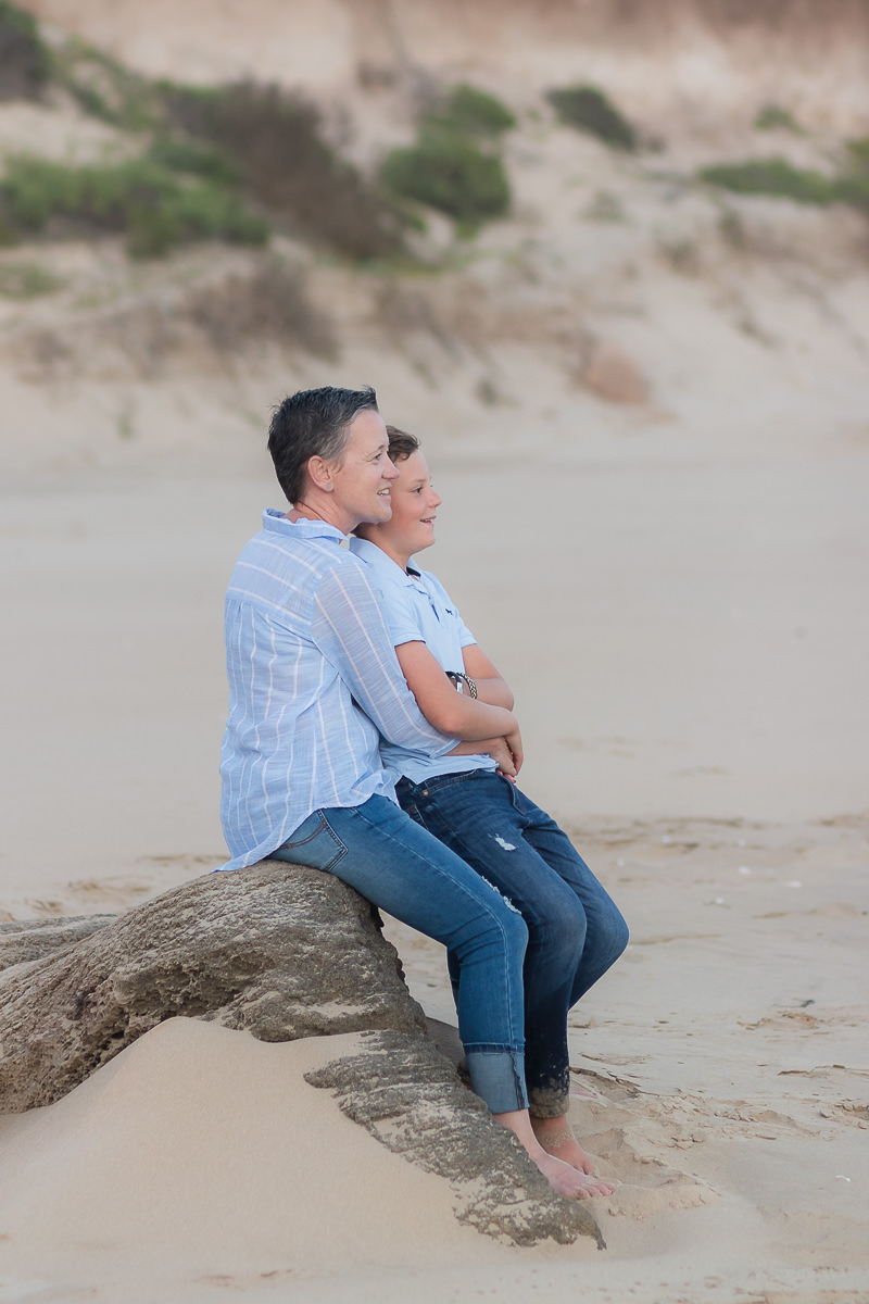 Mother and son on a beach at sunset in Sedgefield garden route during a photoshoot by moi du toi photography