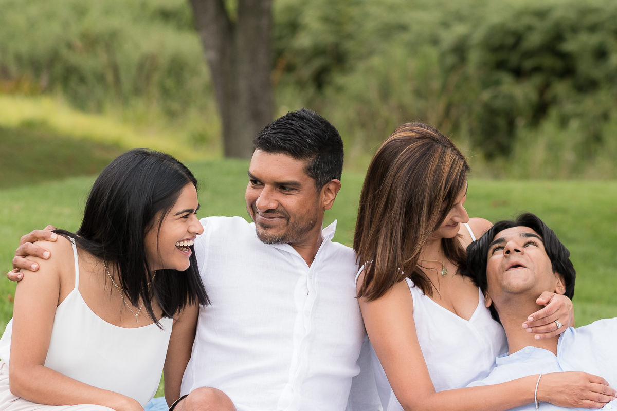 family of four posing for photoshoot at Fancourt in George