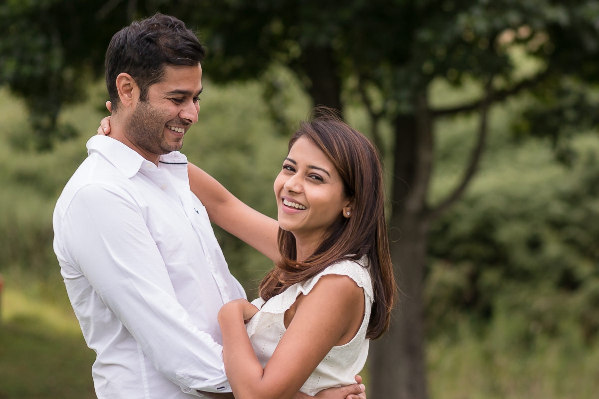 Couple hugging during outdoor session at Fancourt George