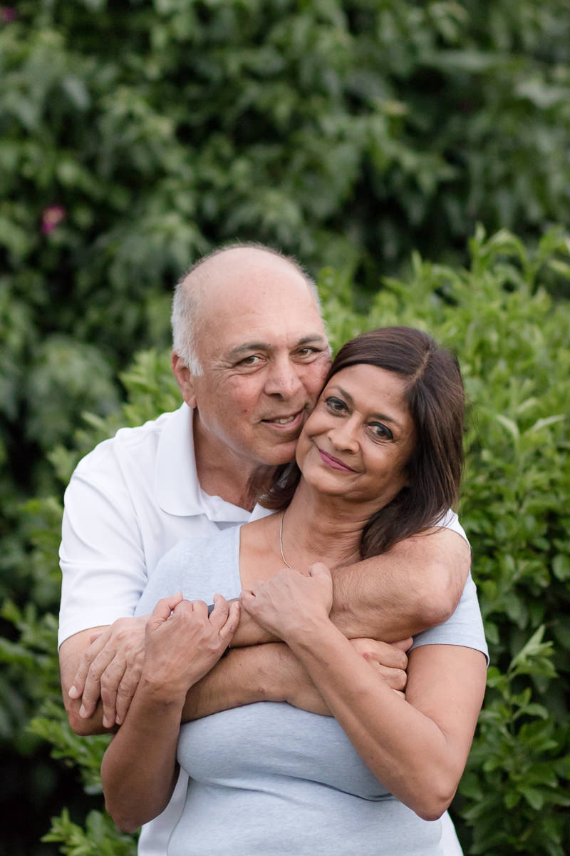 Older Couple hugging during family photo session at Fancourt George