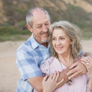 couple kissing sunset family photo session at Myoli Beach Sedgefield photo