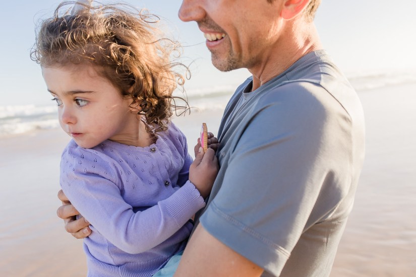 Dad holding little girl family photo session at Myoli Beach Sedgefield photo