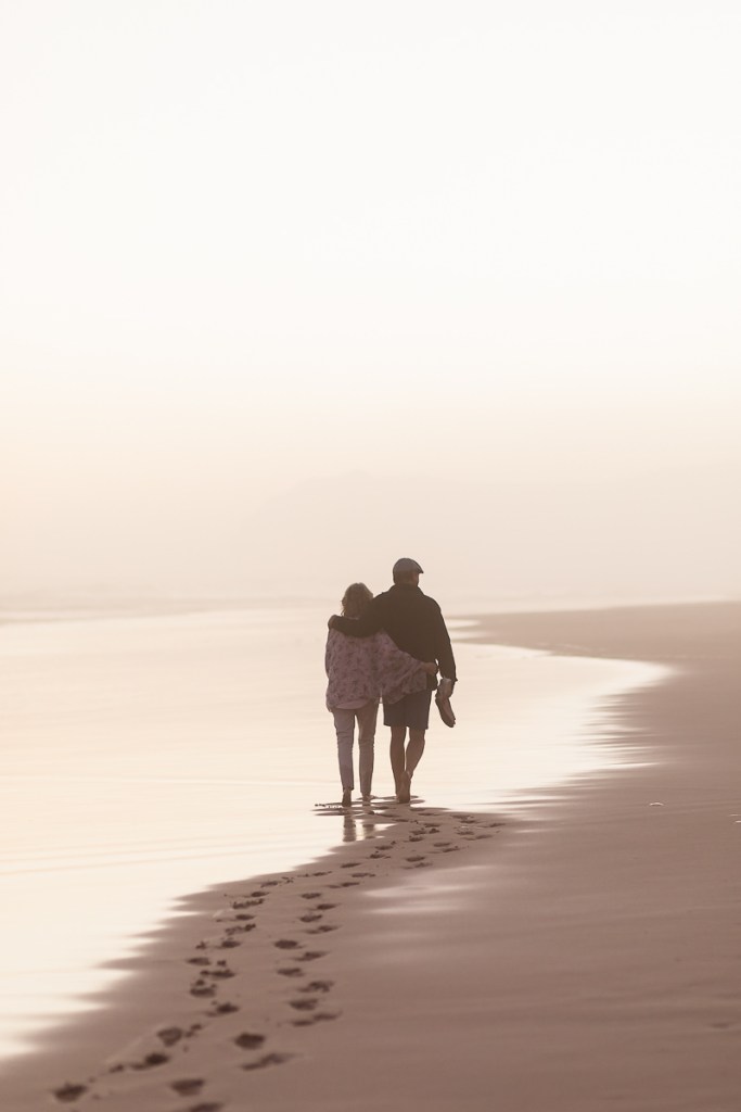 couple walking sunset family photo session at Myoli Beach Sedgefield photographer moi du toi