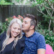man kissing woman on temple during couples photoshoot sedgefield knysna