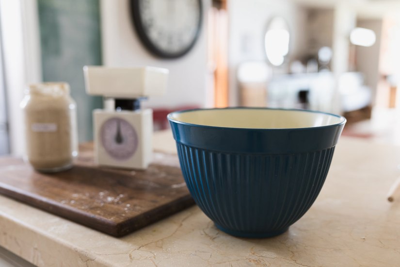 making sourdough bread blue mixing bowl personal branding photoshoot Cola Beach sedgefield knysna