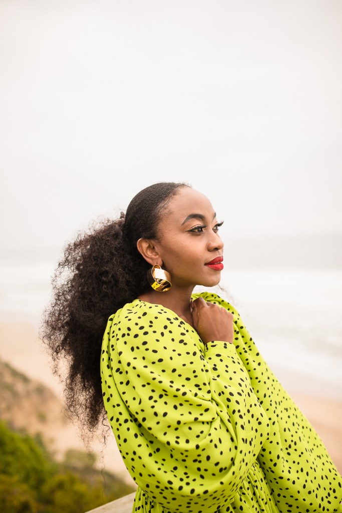 fashion model posing on myoli beach sedgefield during a sunset photoshoot by photographer moira du toit
