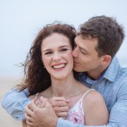 Couple embrace during family shoot myoli beach sedgefield moi du toi photography